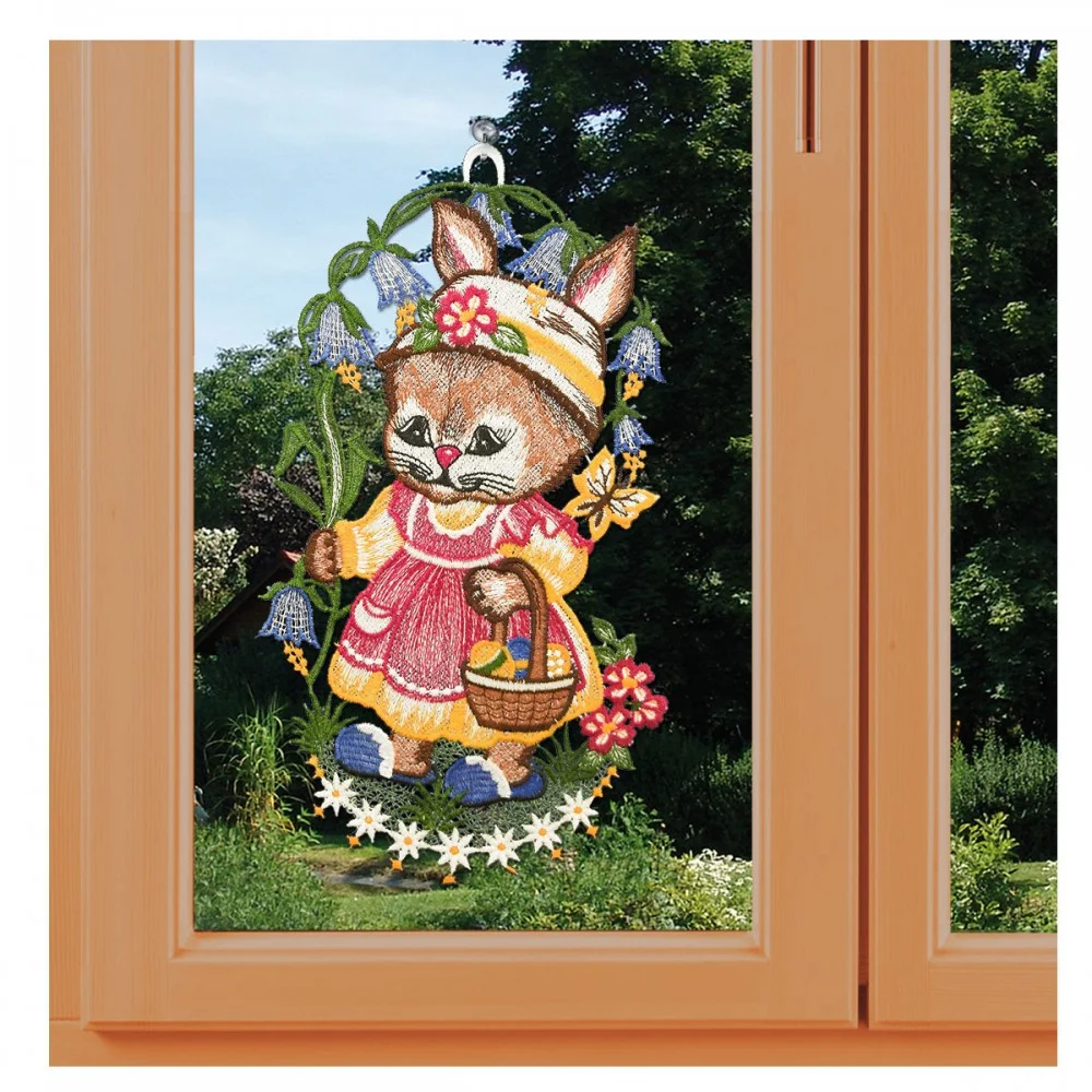 Fensterbild Hasenmädchen mit Osterkorb an einem Fenster
