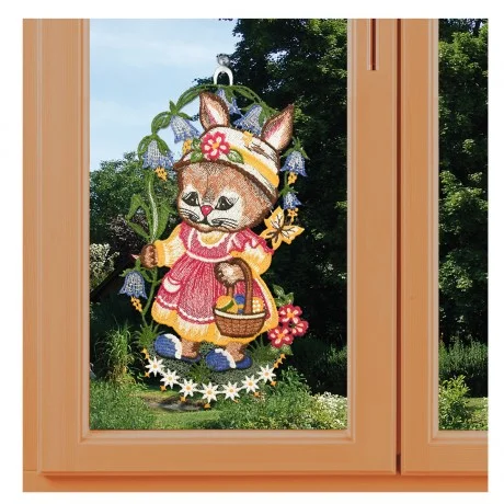 Fensterbild Hasenmädchen mit Osterkorb an einem Fenster