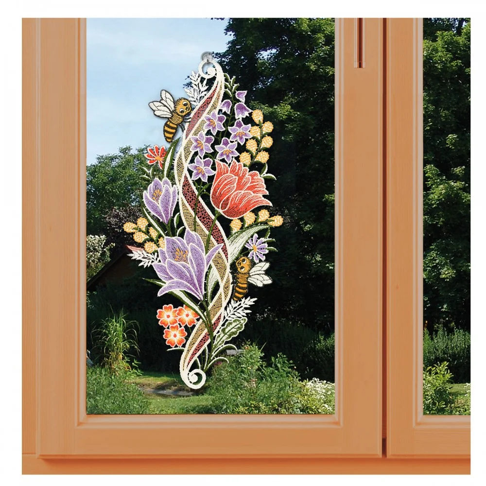 Fensterbild Frühlingserwachen mit Blumenmotiv an einem Fenster