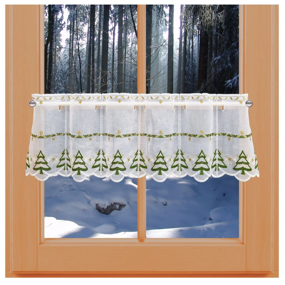 Scheibengardine Tannenbaum mit Sternen an einem Fenster