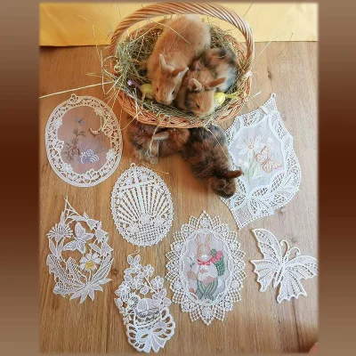 Frühlings-Fensterbilder aus Plauener Spitze Beispielbild